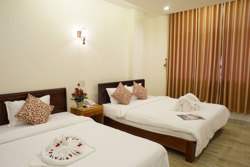 La Maison Danang Beach Hotel Buitenkant foto