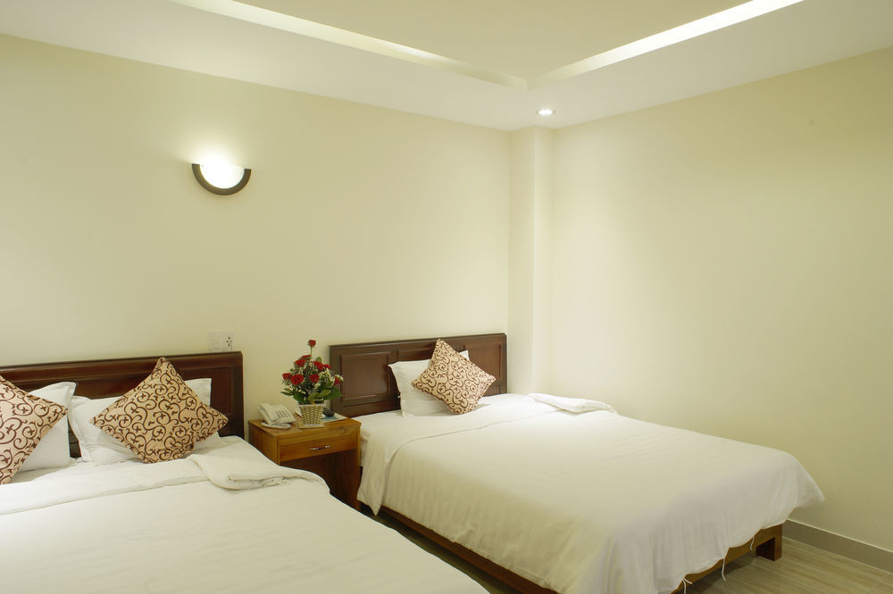 La Maison Danang Beach Hotel Buitenkant foto
