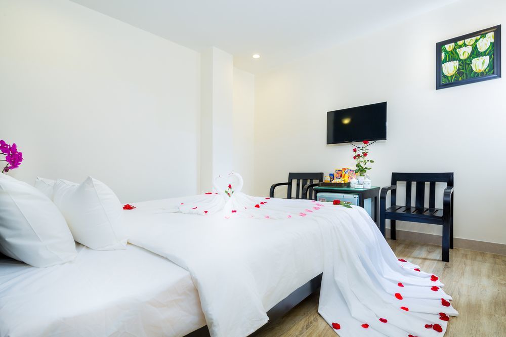 La Maison Danang Beach Hotel Buitenkant foto